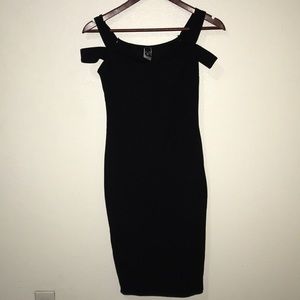 Black dress. Open shoulders